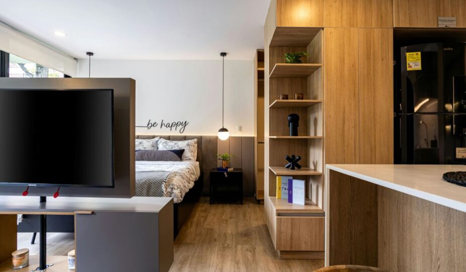 Modern studio apartment featuring smart storage solutions, multifunctional furniture, and stylish decor.