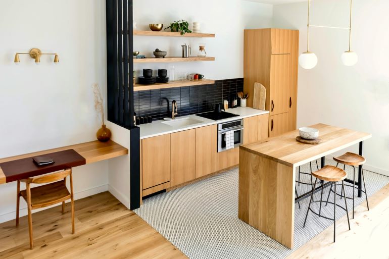 A compact kitchen and dining area.