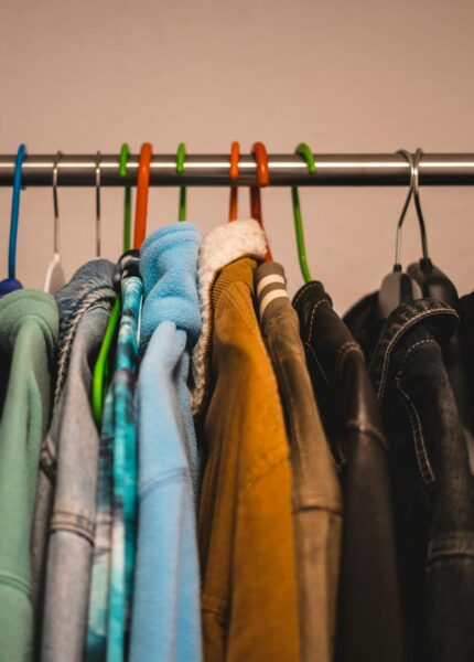 organizing your clothes by season with hangers