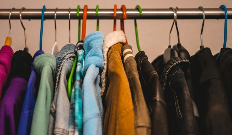 organizing your clothes by season with hangers