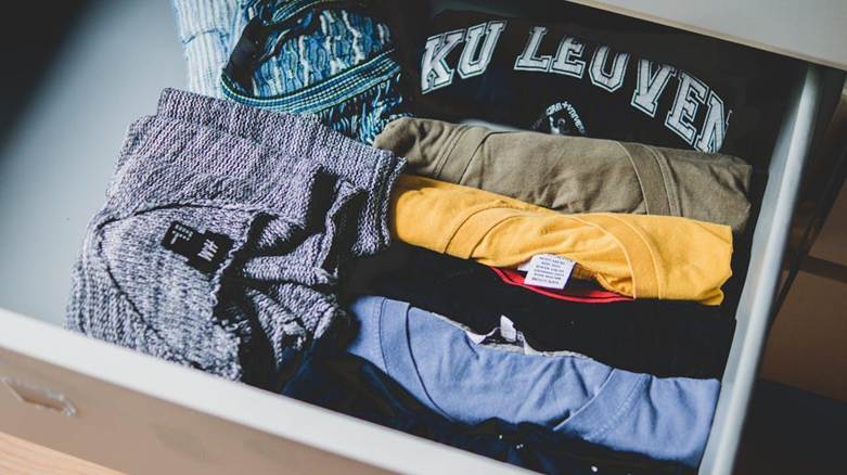 folded clothes in a drawer