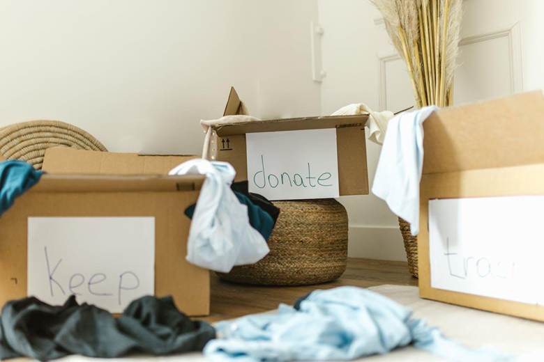 keep donated trash boxes of clothes