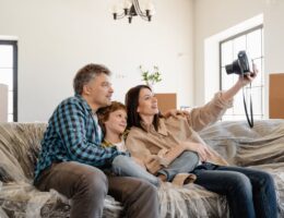 a family moving into their new home and thinking about eco-friendly design tips for a sustainable home transformation