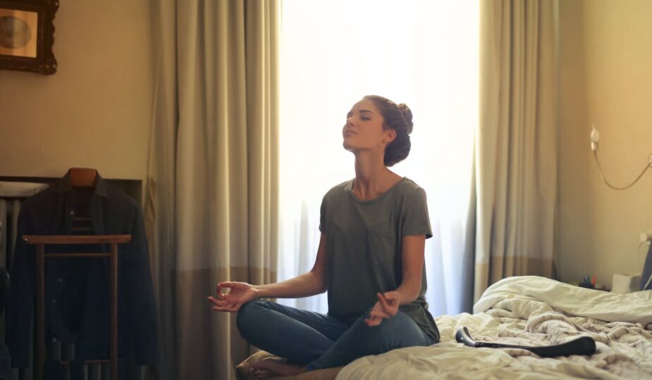 woman designing her bedroom to assist her morning and nighttime rituals